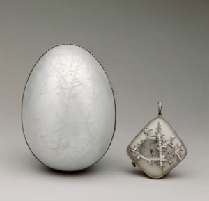 The Nobel’s Ice Egg 1914 with platinum, silver, diamonds, pearls and enamel. A diamond-decorated watch pendant made of opalescent rock crystal.