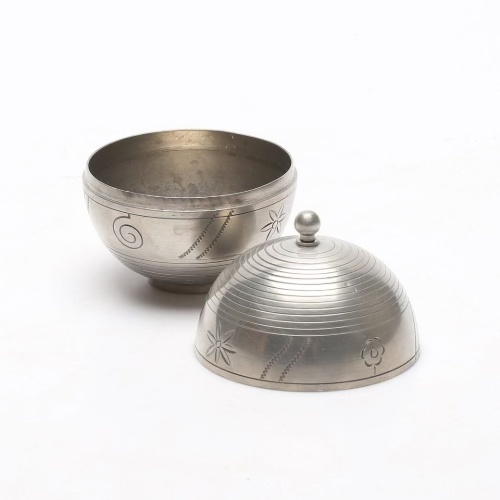 Rounden metalwork bonbonjaire by Sylvia Stave.